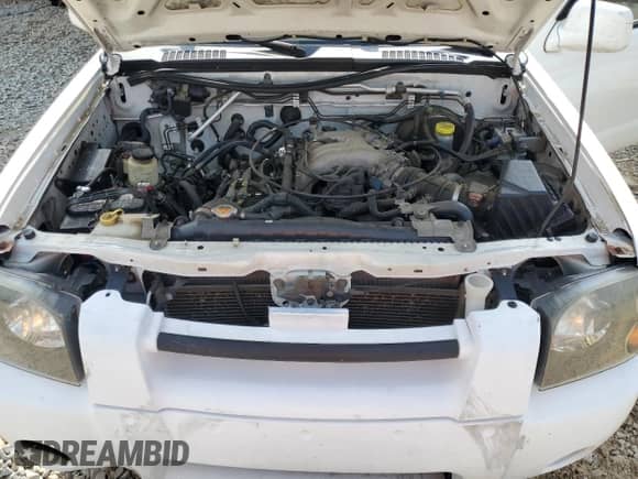2001 Nissan Frontier SE with VIN 1N6ED27T91C344946, listed as a Copart auction lot 57488105 with 183,127 mi miles and Salvage title. Bid and sale history available at DreamBid. Image 11.