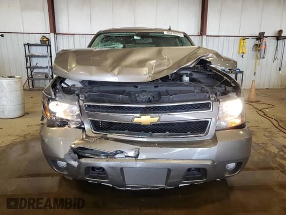 2012 Chevrolet Tahoe LS with VIN 1GNSKAE06CR227928, listed as a Copart auction lot 65878915 with 117,985 mi miles and Salvage title. Bid and sale history available at DreamBid. Image 5.
