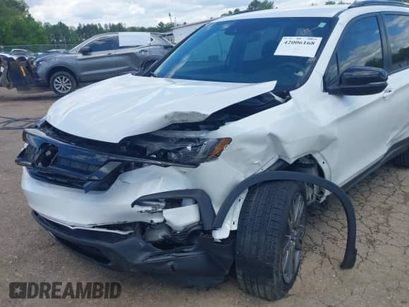 2022 Honda Pilot Sport with VIN 5FNYF5H33NB017719, listed as a IAAI auction lot 42006168 with 67,749 mi miles and . Bid and sale history available at DreamBid. Image 18.