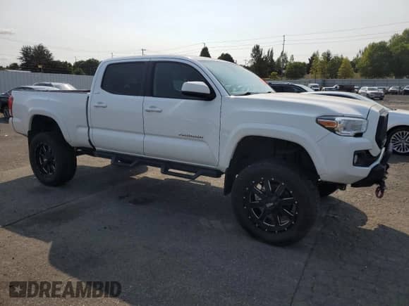 2019 Toyota Tacoma SR5 с VIN 5TFDZ5BN7KX041281, выставлен на аукционе Copart как лот 80924775 с пробегом Не указан миль и Списание • Salvage title. История ставок и продаж доступна на DreamBid. Изображение 4.