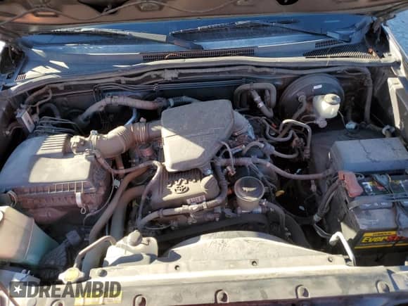 2012 Toyota Tacoma с VIN 5TFTX4CN3CX012016, выставлен на аукционе Copart как лот 90054215 с пробегом 129 993 миль миль и Списание • Salvage title. История ставок и продаж доступна на DreamBid. Изображение 11.