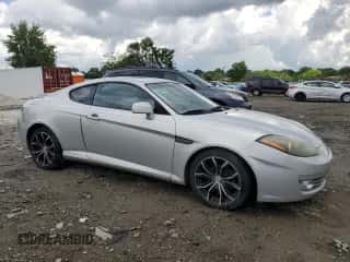 2008 Hyundai Tiburon GT с VIN KMHHN66F48U270030, выставлен на аукционе Copart как лот 55349275 с пробегом 205 068 миль миль и Списание • Salvage title. История ставок и продаж доступна на DreamBid. Изображение 4.