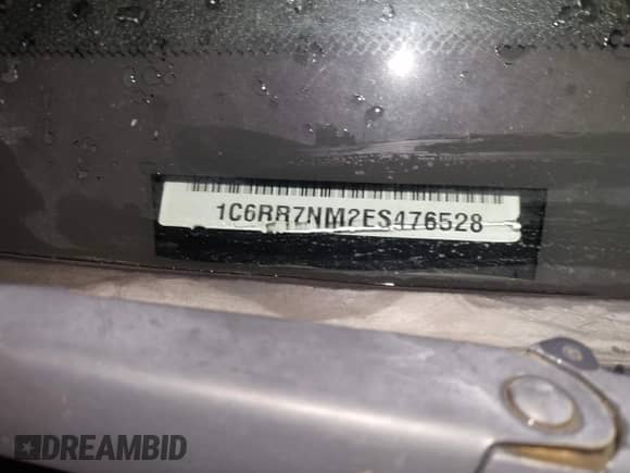 2014 Ram 1500 Laramie z VIN 1C6RR7NM2ES476528, wystawiony jako IAAI lot #42309574 z przebiegiem 150 307 mil mil oraz . Historia ofert i sprzedaży dostępna na DreamBid. Obrazek 9.