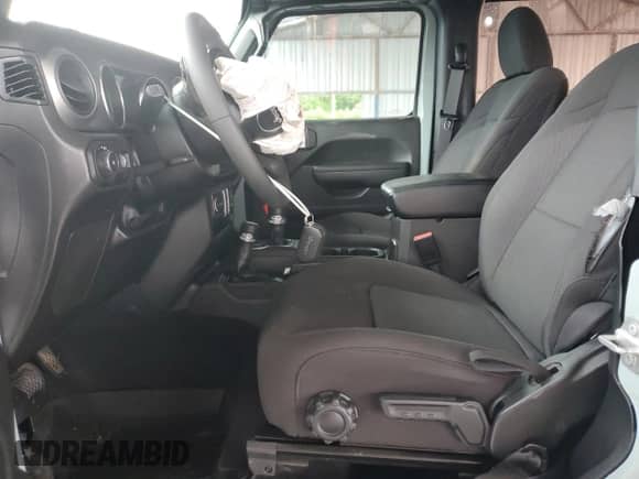 2023 Jeep Wrangler Sport with VIN 1C4HJXAG3PW633586, listed as a Copart auction lot 58744785 with 32,212 mi miles and Salvage title. Bid and sale history available at DreamBid. Image 7.