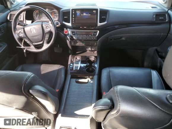 2018 Honda Pilot Touring с VIN 5FNYF5H95JB017056, выставлен на аукционе Copart как лот 85129355 с пробегом 90 621 миль миль и Списание • Salvage title. История ставок и продаж доступна на DreamBid. Изображение 8.