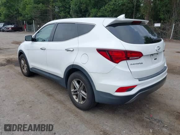 2017 Hyundai Santa Fe 2.4L z VIN 5XYZTDLB0HG393894, wystawiony jako IAAI lot #42744520 z przebiegiem 81 644 mil mil oraz . Historia ofert i sprzedaży dostępna na DreamBid. Obrazek 3.