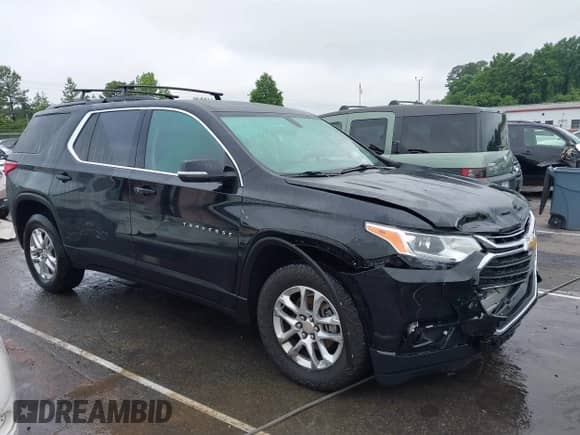 2019 Chevrolet Traverse LT Cloth z VIN 1GNEVGKW4KJ177866, wystawiony jako IAAI lot #42220370 z przebiegiem 101 731 mil mil oraz . Historia ofert i sprzedaży dostępna na DreamBid. Obrazek 13.