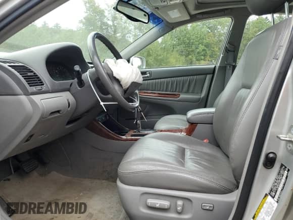 2004 Toyota Camry XLE с VIN 4T1BF30K14U579715, выставлен на аукционе Copart как лот 71749745 с пробегом 84 539 миль миль и Списание • Salvage title. История ставок и продаж доступна на DreamBid. Изображение 7.