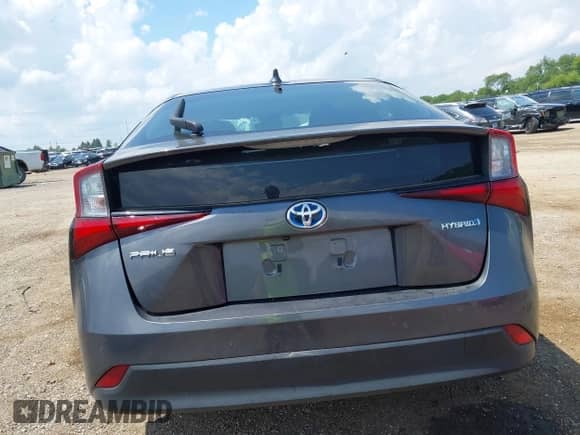 2022 Toyota Prius L Eco with VIN JTDKAMFU5N3160758, listed as a IAAI auction lot 42699871 with 64,403 mi miles and . Bid and sale history available at DreamBid. Image 16.