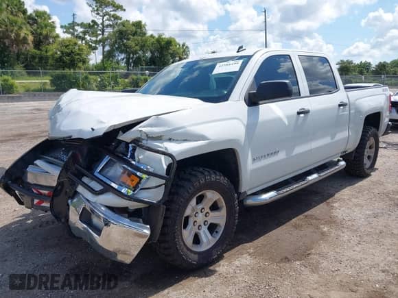 2014 Chevrolet Silverado 1500 LT z VIN 3GCUKREC6EG165041, wystawiony jako IAAI lot #42588499 z przebiegiem 189 554 mil mil oraz . Historia ofert i sprzedaży dostępna na DreamBid. Obrazek 2.