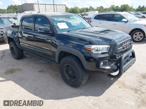 2018 Toyota Tacoma SR5 with VIN 5TFAZ5CN0JX055121, listed as a IAAI auction lot 43402426 with 178,992 mi miles and . Bid and sale history available at DreamBid. Image 1.