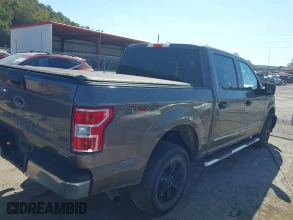 2020 Ford F-150 XLT with VIN 1FTEW1E49LFA24353, listed as a IAAI auction lot 43191576 with 58,463 mi miles and . Bid and sale history available at DreamBid. Image 4.