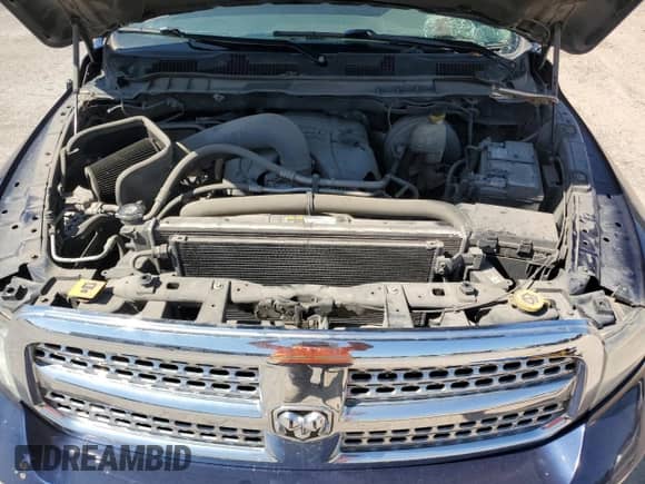 2014 Ram 1500 z VIN 0K1945894912, wystawiony jako Copart lot #71580014 z przebiegiem 36 940 mil mil oraz Czysty tytuł • Clean title. Historia ofert i sprzedaży dostępna na DreamBid. Obrazek 11.