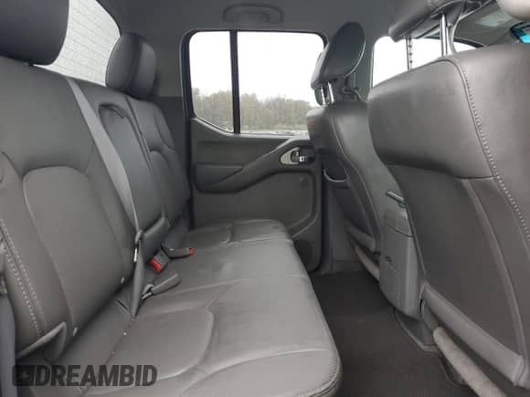 2010 Nissan Frontier LE with VIN 1N6AD0EV0AC419279, listed as a Copart auction lot 82463385 with 83,722 mi miles and Salvage title. Bid and sale history available at DreamBid. Image 10.