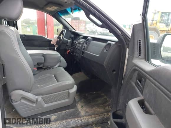 2014 Ford F-150 STX with VIN 1FTFX1CF5EKD93744, listed as a IAAI auction lot 43280853 with 144,024 mi miles and . Bid and sale history available at DreamBid. Image 5.