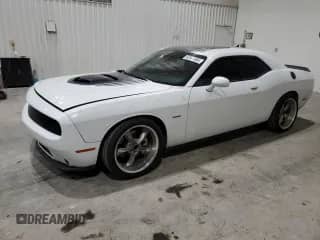 2016 Dodge Challenger R/T Plus с VIN 2C3CDZBT2GH289597, выставлен на аукционе Copart как лот 62847985 с пробегом 127 412 миль миль и Списание • Salvage title. История ставок и продаж доступна на DreamBid. Изображение 1.