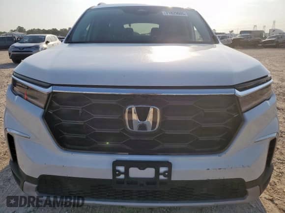 2025 Honda Pilot Elite с VIN 5FNYG1H81SB106864, выставлен на аукционе Copart как лот 71829605 с пробегом 6 767 миль миль и Списание • Salvage title. История ставок и продаж доступна на DreamBid. Изображение 5.