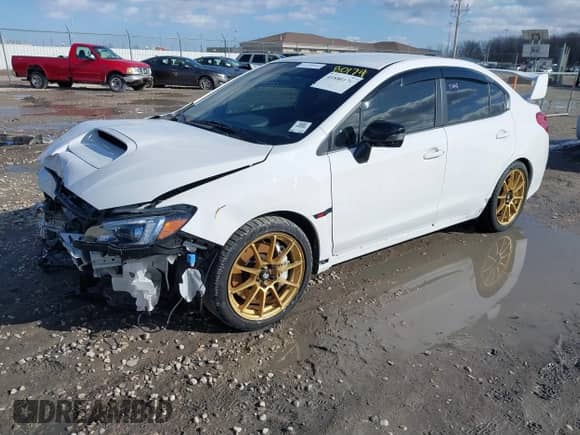 2020 Subaru WRX STI with VIN JF1VA2S69L9812905, listed as a IAAI auction lot 41880174 with 32,202 mi miles and . Bid and sale history available at DreamBid. Image 2.
