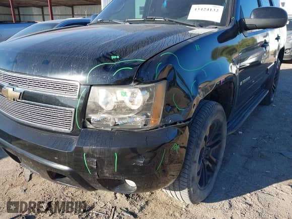 2007 Chevrolet Tahoe LTZ with VIN 1GNFK13027R249676, listed as a IAAI auction lot 43424132 with 296,751 mi miles and . Bid and sale history available at DreamBid. Image 6.