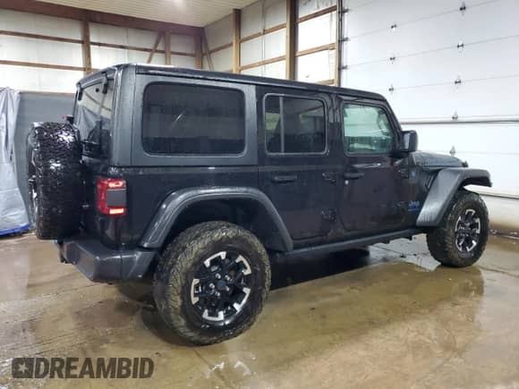 2024 Jeep Wrangler Rubicon with VIN 1C4RJXR65RW269562, listed as a Copart auction lot 85818955 with 36,764 mi miles and Clean title. Bid and sale history available at DreamBid. Image 3.