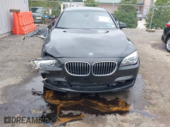 2013 BMW 7 Series 750Li xDrive with VIN WBAYF8C57DD140484, listed as a IAAI auction lot 43050769 with 89,062 mi miles and . Bid and sale history available at DreamBid. Image 13.