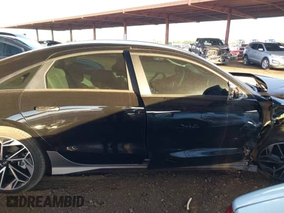 2023 Hyundai Ioniq 6 SEL with VIN KMHM34AA2PA020922, listed as a IAAI auction lot 43075612 with 14,084 mi miles and . Bid and sale history available at DreamBid. Image 14.