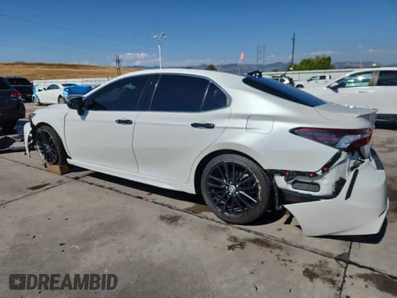 2022 Toyota Camry TRD with VIN 4T1KZ1AK5NU060906, listed as a Copart auction lot 70921655 with 59,222 mi miles and Salvage title. Bid and sale history available at DreamBid. Image 2.