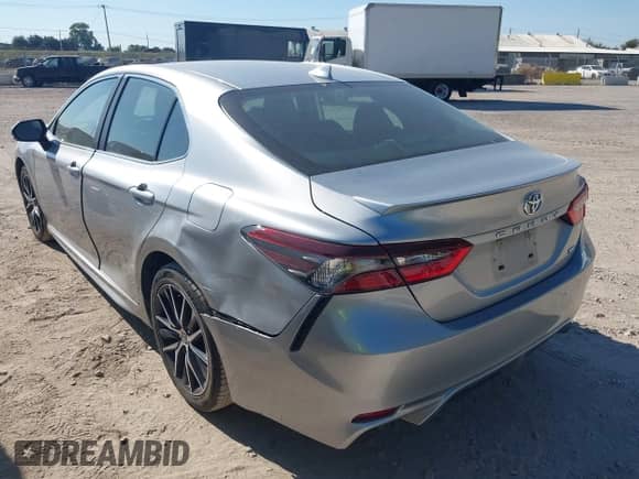 2023 Toyota Camry SE z VIN 4T1G11AK3PU791463, wystawiony jako IAAI lot #43412087 z przebiegiem 66 858 mil mil oraz . Historia ofert i sprzedaży dostępna na DreamBid. Obrazek 3.