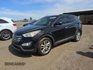 2014 Hyundai Santa Fe with VIN 5XYZUDLAXEG200294, listed as a Copart auction lot 69449845 with 128,035 mi miles and Clean title. Bid and sale history available at DreamBid. Image 1.
