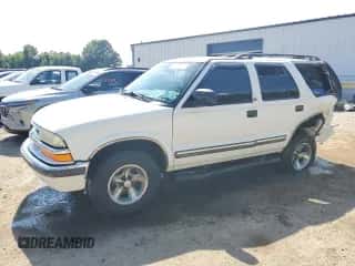 2001 Chevrolet Blazer LS z VIN 1GNCS13W91K262044, wystawiony jako Copart lot #61214774 z przebiegiem Nie podano mil oraz Szkoda całkowita • Salvage title. Historia ofert i sprzedaży dostępna na DreamBid. Obrazek 1.