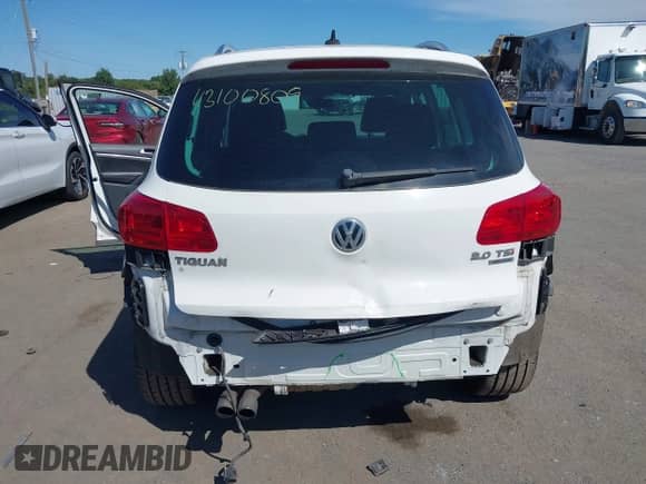 2013 Volkswagen Tiguan S z VIN WVGBV3AX2DW611914, wystawiony jako IAAI lot #43100809 z przebiegiem 89 767 mil mil oraz . Historia ofert i sprzedaży dostępna na DreamBid. Obrazek 6.
