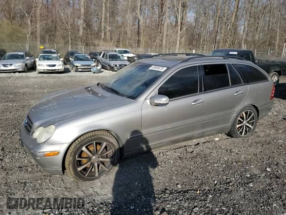 2004 Mercedes-Benz C 240 with VIN WDBRH61J14F528853, listed as a Copart auction lot 49995875 with 169,668 mi miles and Salvage title. Bid and sale history available at DreamBid. Image 1.