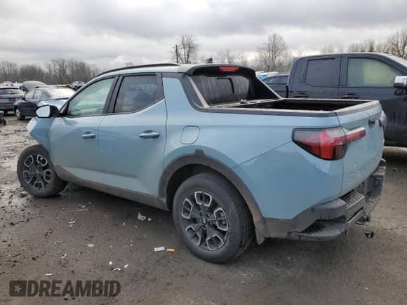 2022 Hyundai Santa Cruz SEL Premium z VIN 5NTJDDAF9NH038731, wystawiony jako Copart lot #42001124 z przebiegiem 14 208 mil mil oraz Szkoda całkowita • Salvage title. Historia ofert i sprzedaży dostępna na DreamBid. Obrazek 2.