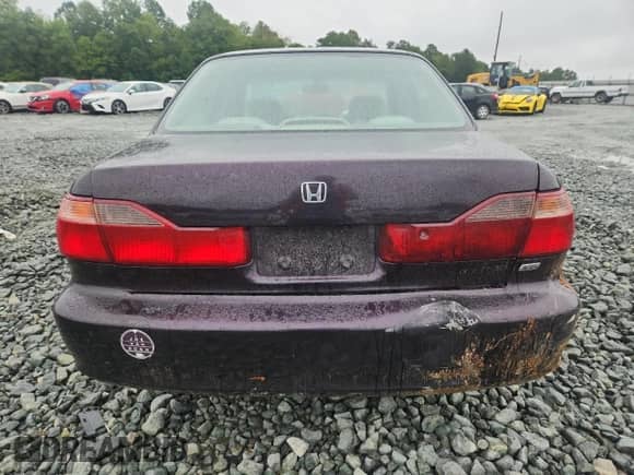 1999 Honda Accord LX with VIN 1HGCG1646XA055650, listed as a Copart auction lot 67988925 with 225,472 mi miles and Salvage title. Bid and sale history available at DreamBid. Image 6.