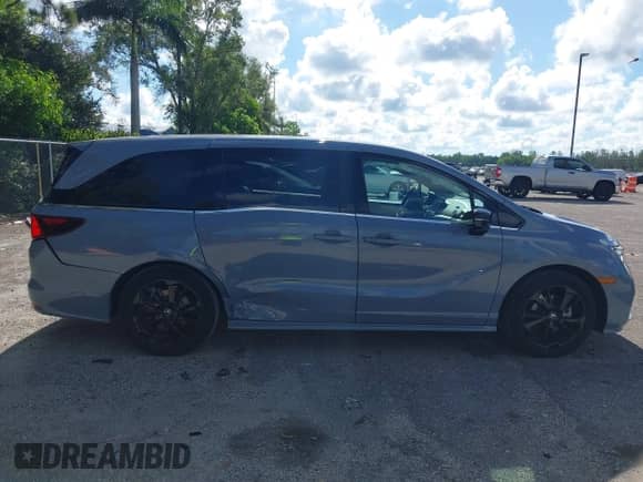 2023 Honda Odyssey Sport z VIN 5FNRL6H7XPB070667, wystawiony jako IAAI lot #42995029 z przebiegiem 13 446 mil mil oraz . Historia ofert i sprzedaży dostępna na DreamBid. Obrazek 13.