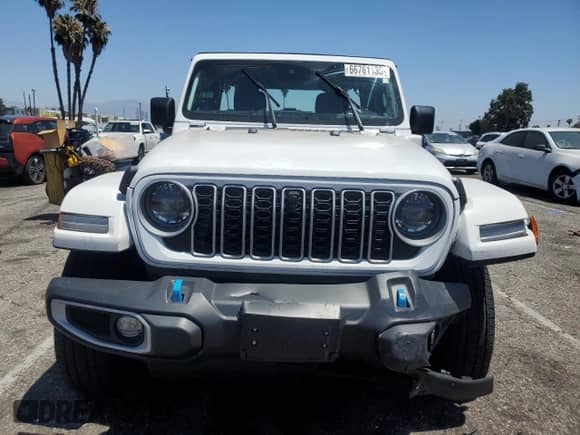 2024 Jeep Wrangler Sahara z VIN 1C4RJXP65RW192128, wystawiony jako Copart lot #66761135 z przebiegiem 16 491 mil mil oraz Szkoda całkowita • Salvage title. Historia ofert i sprzedaży dostępna na DreamBid. Obrazek 5.