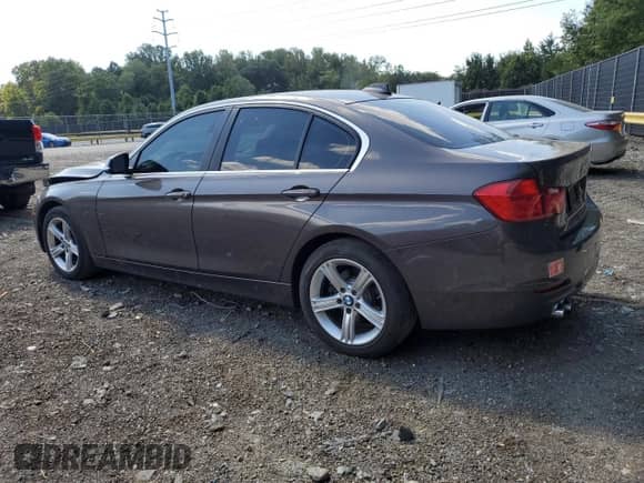 2015 BMW 3 Series 328i with VIN WBA3A5C5XFF607380, listed as a Copart auction lot 70839195 with 61,697 mi miles and Salvage title. Bid and sale history available at DreamBid. Image 2.