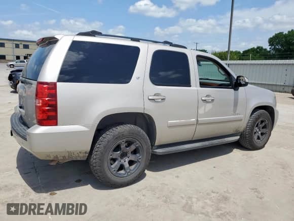 2007 Chevrolet Tahoe LS с VIN 1GNFC13JX7R153378, выставлен на аукционе Copart как лот 59350705 с пробегом 206 022 миль миль и Списание • Salvage title. История ставок и продаж доступна на DreamBid. Изображение 3.
