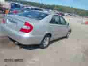 2002 Toyota Camry LE z VIN 4T1BE32KX2U638242, wystawiony jako IAAI lot #43350493 z przebiegiem 221 220 mil mil oraz . Historia ofert i sprzedaży dostępna na DreamBid. Obrazek 4.