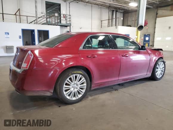 2013 Chrysler 300 с VIN 2C3CCARG0DH736145, выставлен на аукционе Copart как лот 62580065 с пробегом 127 176 миль миль и Списание • Salvage title. История ставок и продаж доступна на DreamBid. Изображение 3.