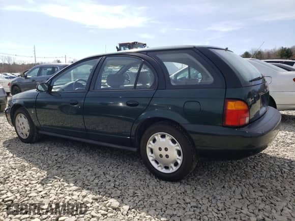 1997 Saturn SW with VIN 1G8ZK8275VZ129102, listed as a Copart auction lot 48857145 with 76,836 mi miles and Clean title. Bid and sale history available at DreamBid. Image 2.