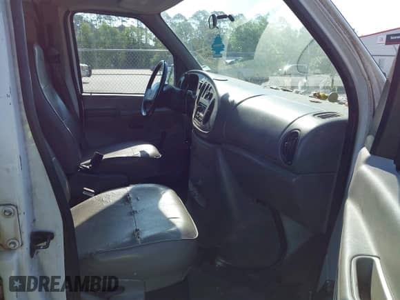 1999 Ford Econoline Cargo with VIN 1FTRE1420XHA34056, listed as a IAAI auction lot 41998411 with 236,267 mi miles and . Bid and sale history available at DreamBid. Image 5.