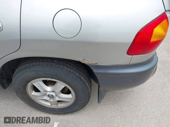 2003 Hyundai Santa Fe GLS with VIN KM8SC73D23U355851, listed as a IAAI auction lot 42168296 with 231,250 mi miles and . Bid and sale history available at DreamBid. Image 13.