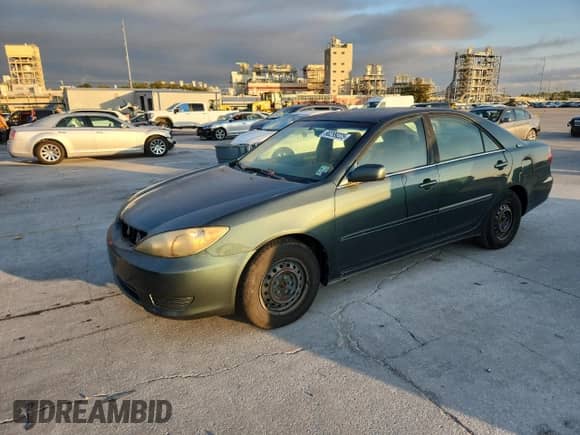 2006 Toyota Camry LE с VIN 4T1BE32K36U138428, выставлен на аукционе Copart как лот 90299225 с пробегом 128 951 миль миль и Чистый • Clean title. История ставок и продаж доступна на DreamBid. Изображение 1.