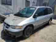 2000 Dodge Caravan LE with VIN 1B4GP54L8YB691240, listed as a Copart auction lot 66009235 with 181,026 mi miles and Salvage title. Bid and sale history available at DreamBid. Image 1.