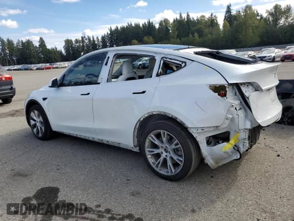 2020 Tesla Model Y Long Range с VIN 5YJYGDEE6LF023427, выставлен на аукционе Copart как лот 81877945 с пробегом 52 307 миль миль и Списание • Salvage title. История ставок и продаж доступна на DreamBid. Изображение 2.