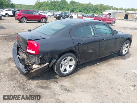 2009 Dodge Charger SE with VIN 2B3LA43V39H639833, listed as a IAAI auction lot 42423543 with 174,611 mi miles and . Bid and sale history available at DreamBid. Image 4.