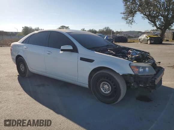2014 Chevrolet Caprice Police Police с VIN 6G3NS5U20EL948528, выставлен на аукционе Copart как лот 83802164 с пробегом 140 623 миль миль и Списание • Salvage title. История ставок и продаж доступна на DreamBid. Изображение 4.