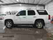 2011 Chevrolet Tahoe LT z VIN 1GNSKBE01BR146873, wystawiony jako IAAI lot #41212135 z przebiegiem 262 793 mil mil oraz . Historia ofert i sprzedaży dostępna na DreamBid. Obrazek 14.