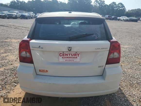 2009 Dodge Caliber SXT with VIN 1B3HB48A89D224125, listed as a Copart auction lot 61968005 with 241,959 mi miles and Salvage title. Bid and sale history available at DreamBid. Image 6.